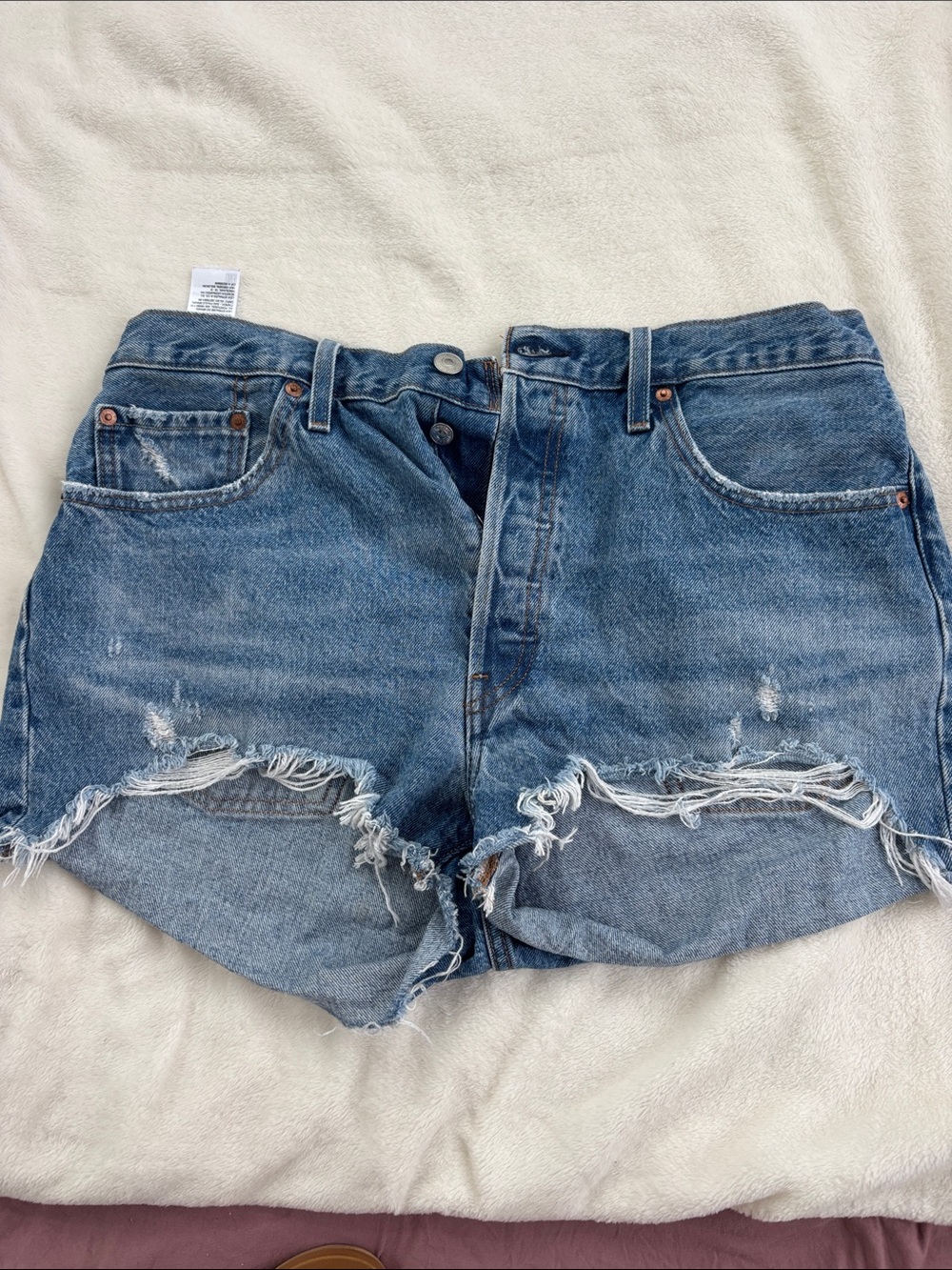 Levi's Medium Blue Distressed Cutoff Denim Shorts
